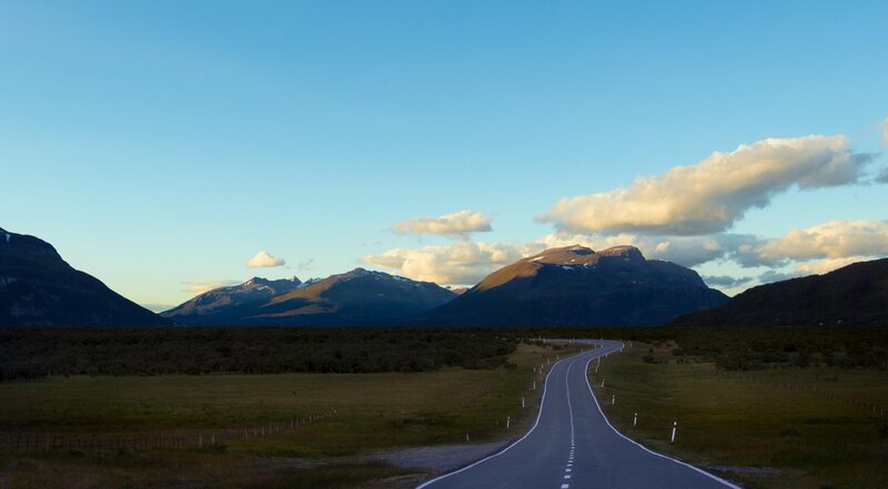 Winding Road in Mountains — Blue, Serene, Sunset