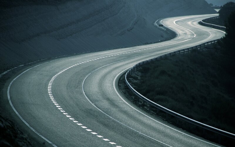 Winding Road in Mountains — Gray, Dramatic, Photograph