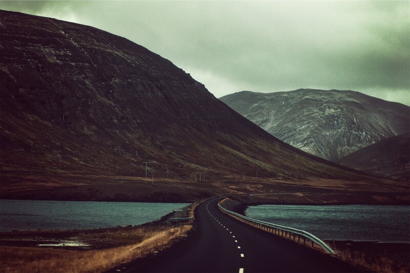 Winding Road in Mountains — Green, Dramatic, Afternoon, Photograph, Lake