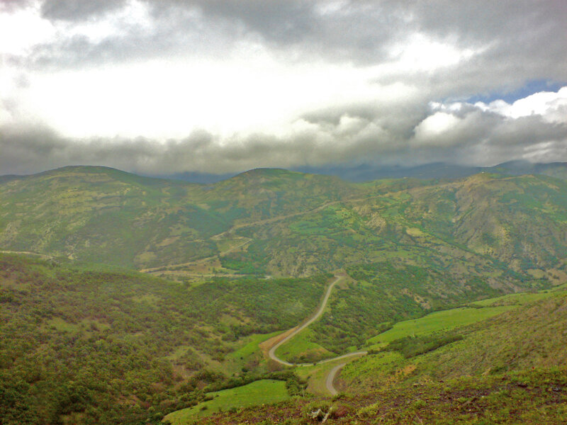 Winding Road in Mountains — Green, Dramatic, Photograph, Clouds, Gray, White
