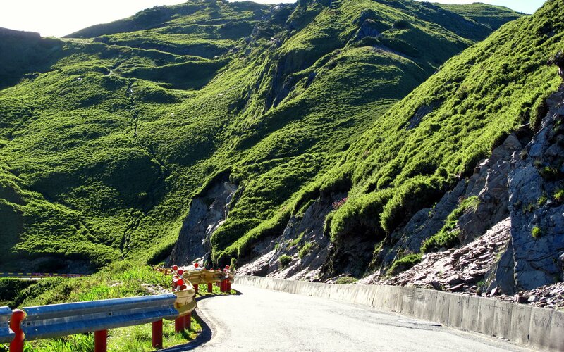 Winding Road in Mountains — Green, Serene, Afternoon, Photograph, Guardrail, Mountain