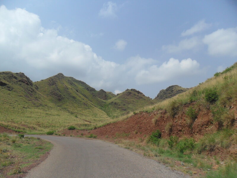 Winding Road in Mountains — Green, Serene, Afternoon, Photograph