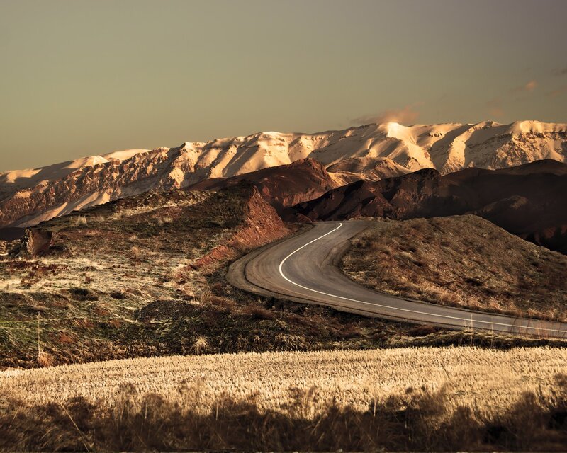 Winding Road in Mountains — Snow