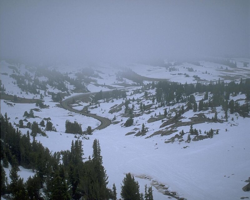 Winding Road in Snow — White, Misty