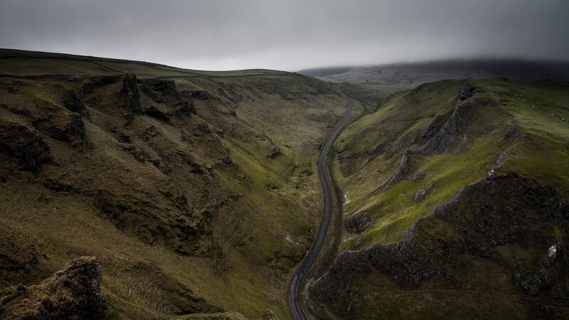 Winding Road in Valley — Green, Dramatic, Photograph, Hills, Clouds