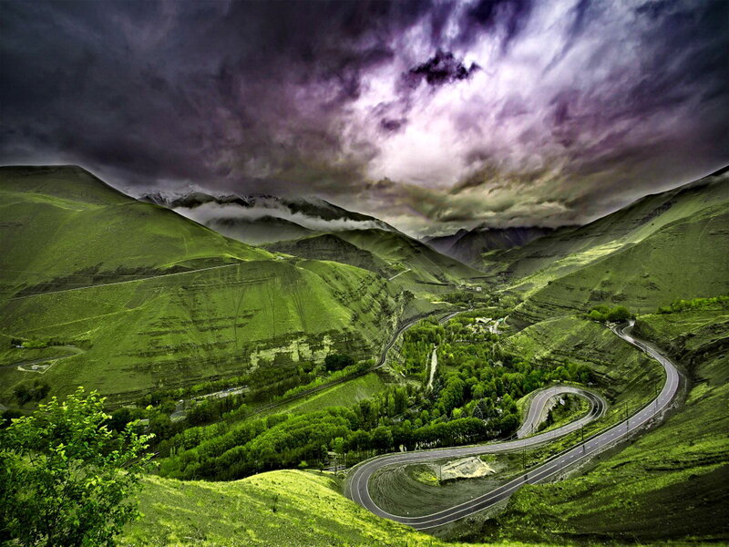 Winding Road in Valley — Green, Dramatic, Photograph, Mountains, Clouds