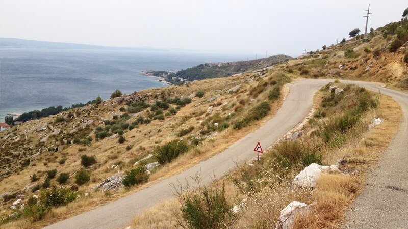 Winding Road on Hillside — Brown, Serene, Afternoon