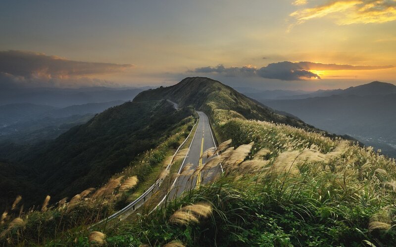 Winding Road on Mountain — Green, Serene, Sunset, Photograph