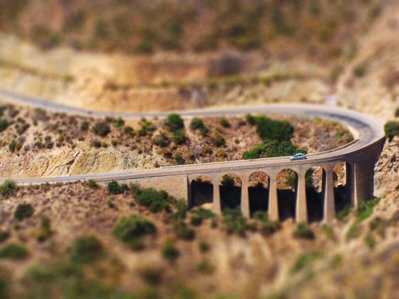 Winding road over a bridge