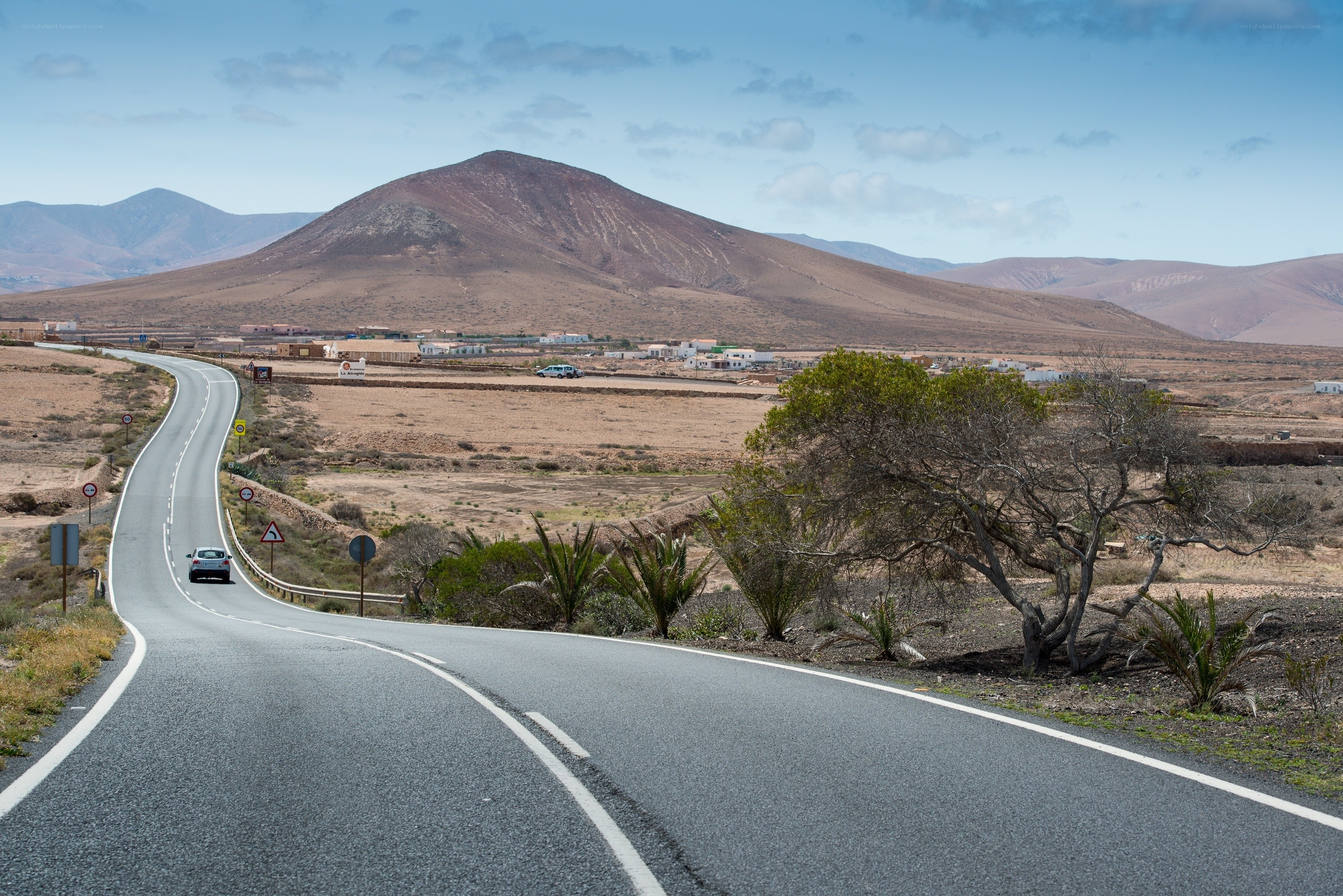 Winding road through arid landscape