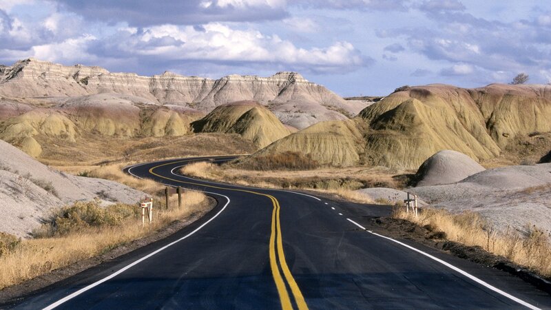 Winding road through badlands