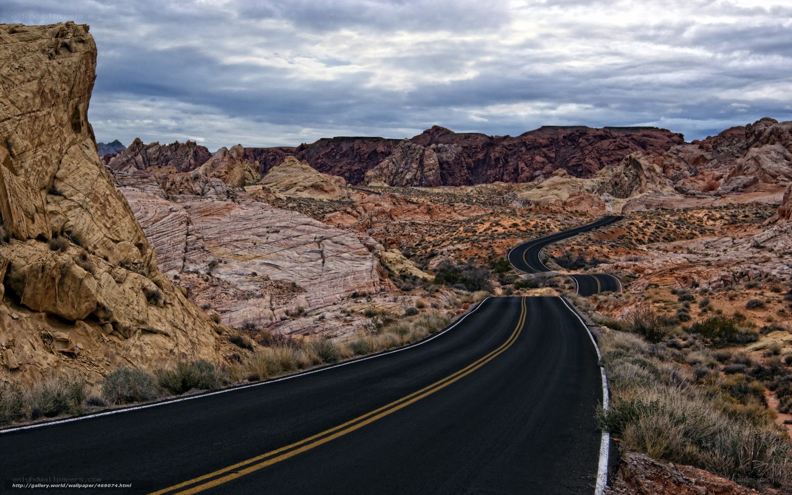Winding road through desert canyon