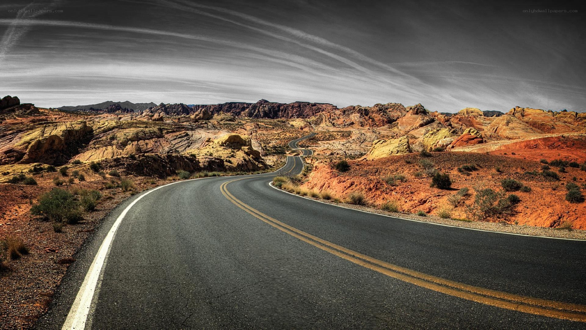 Winding road through desert canyon