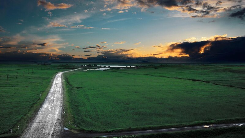 Winding Road Through Fields — Green, Dramatic