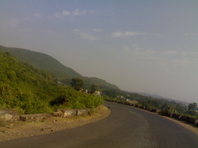 winding road through green hills