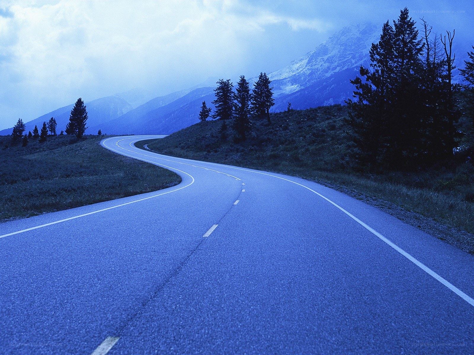 Winding road through mountain landscape