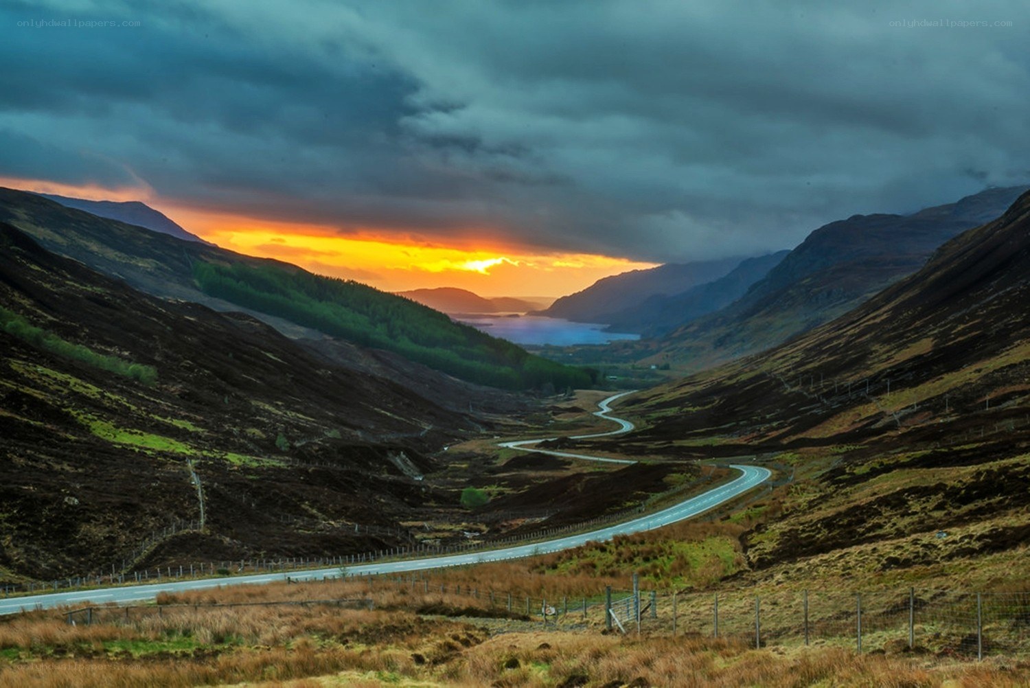 Winding road through mountain valley