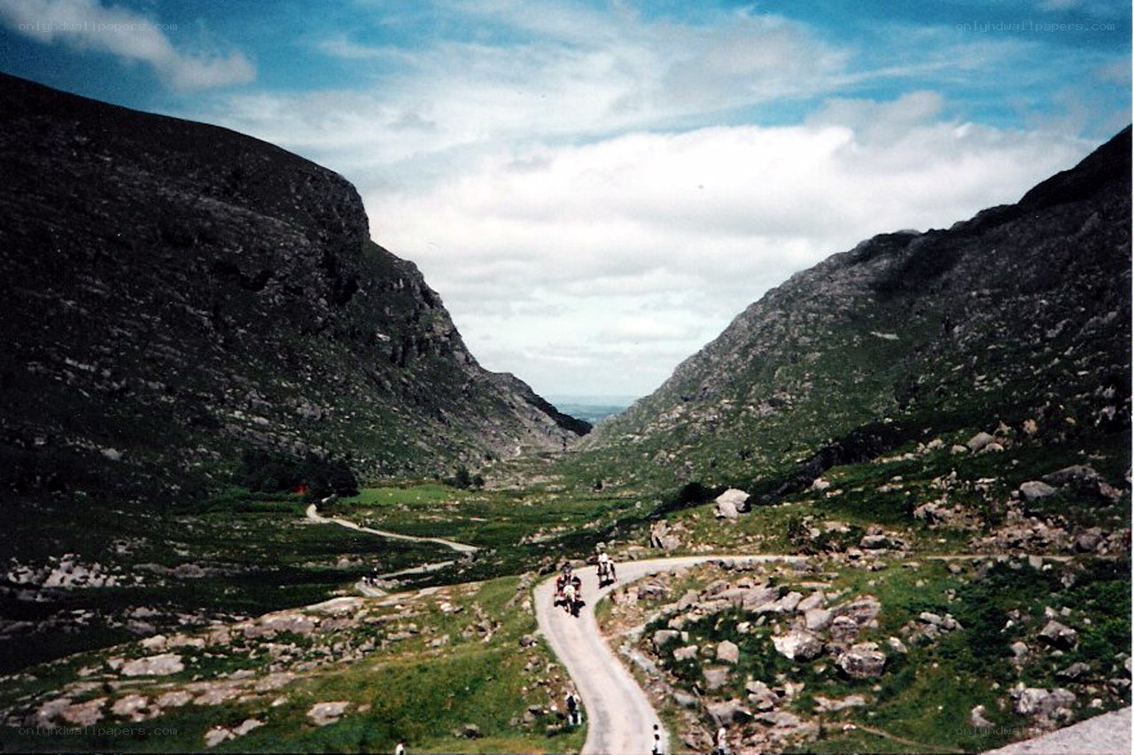 Winding road through mountain valley