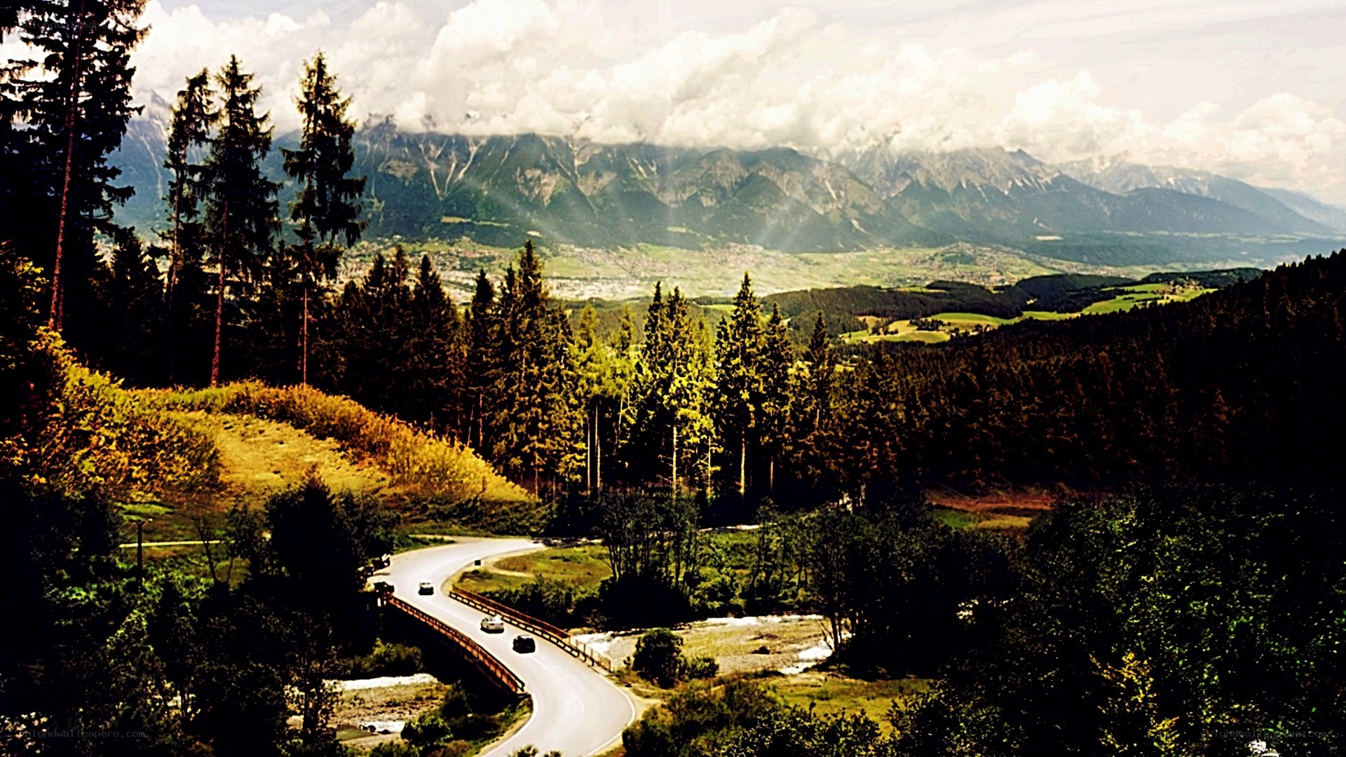 Winding road through mountain valley