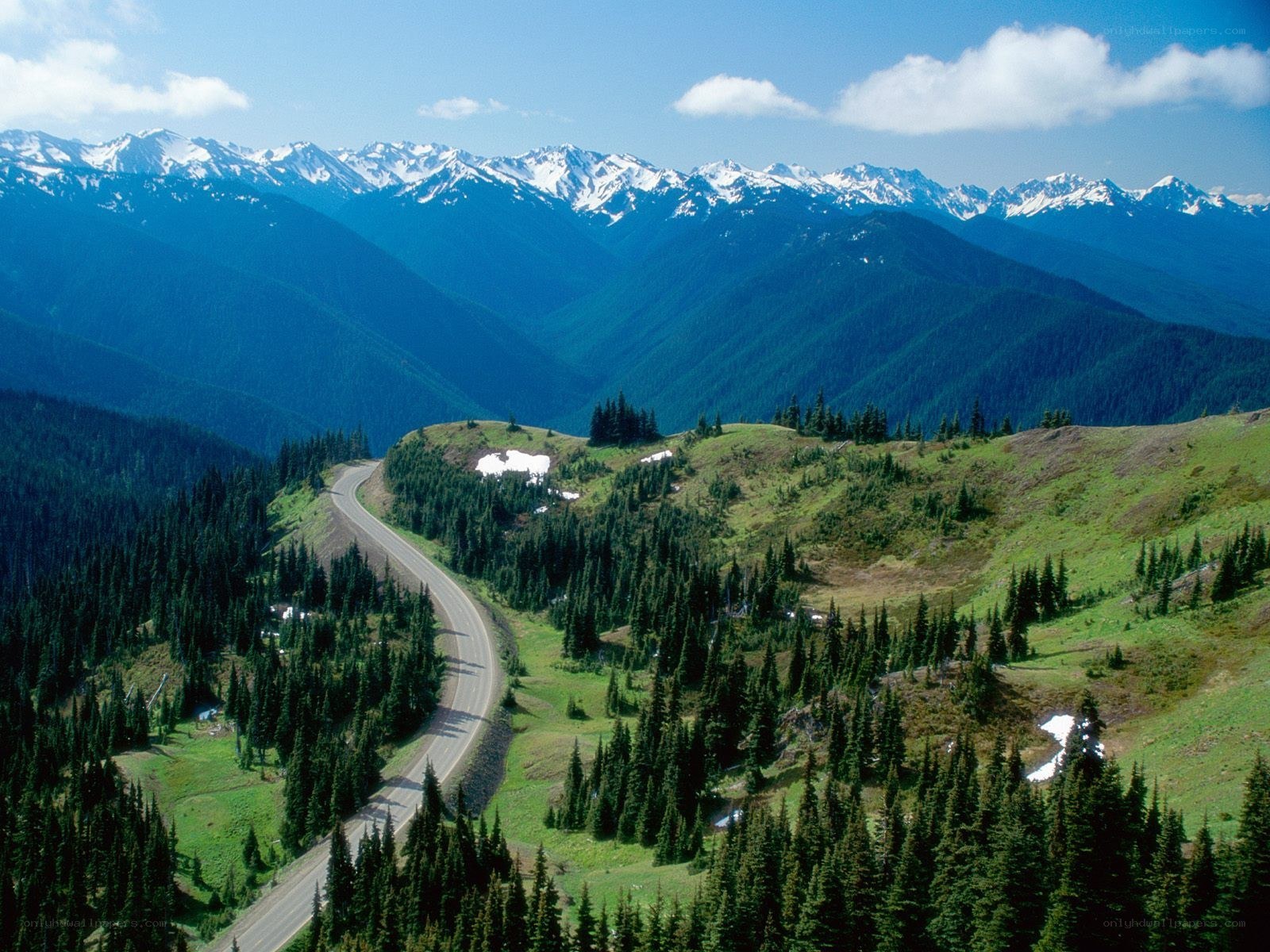 Winding road through mountain valley