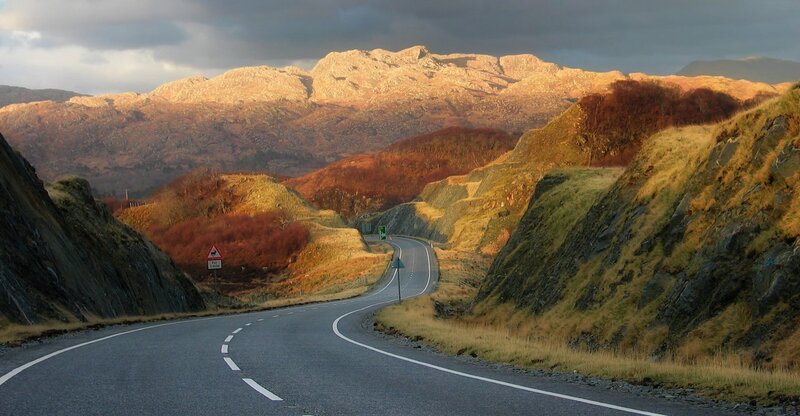Winding road through mountain valley