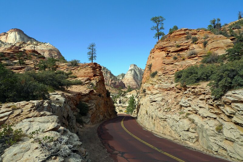 Winding road through red rock canyon