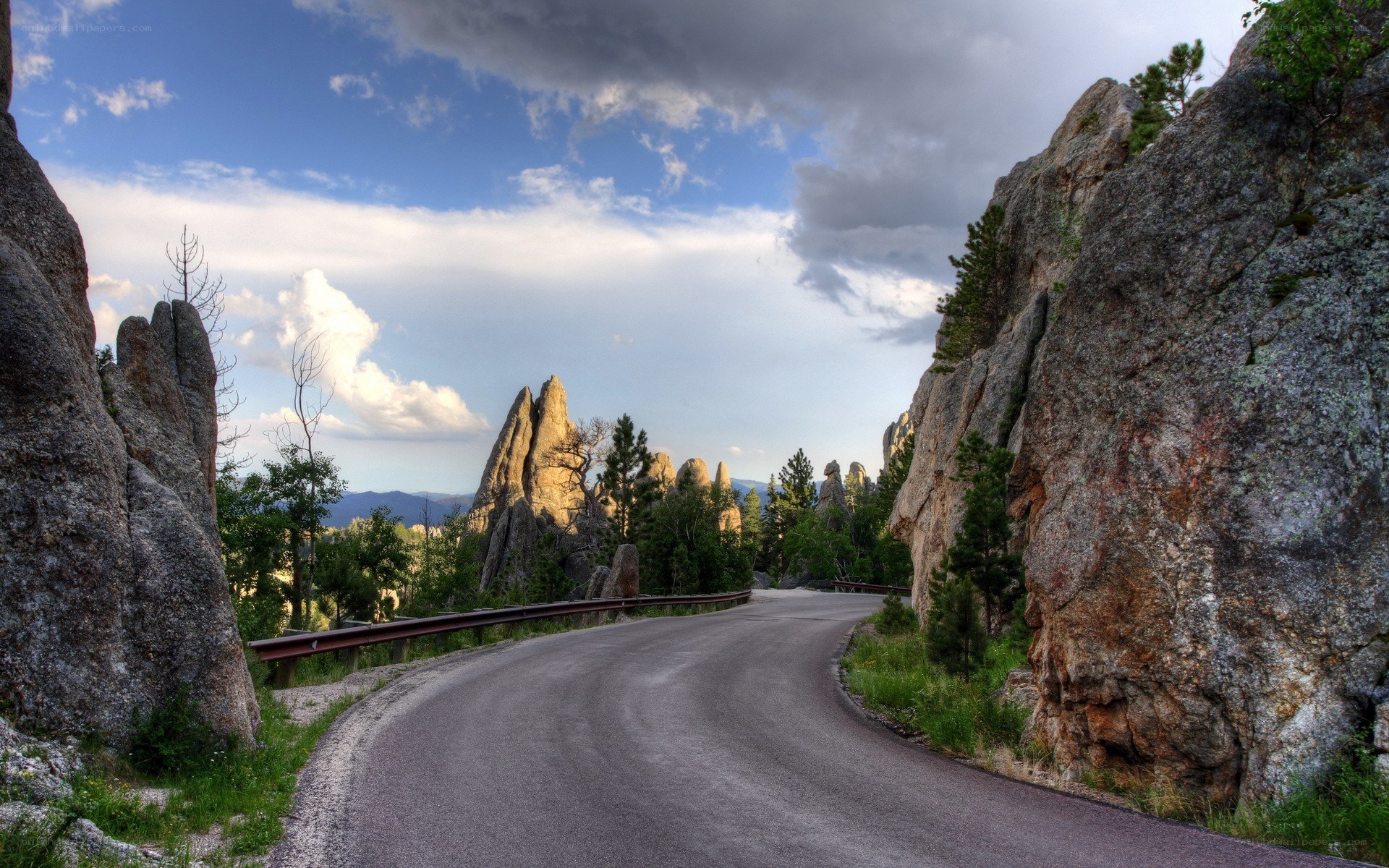 Winding road through rock formations