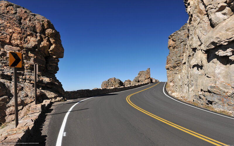 Winding road through rocky canyon