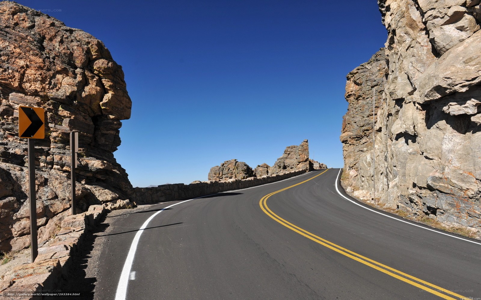 Winding road through rocky canyon