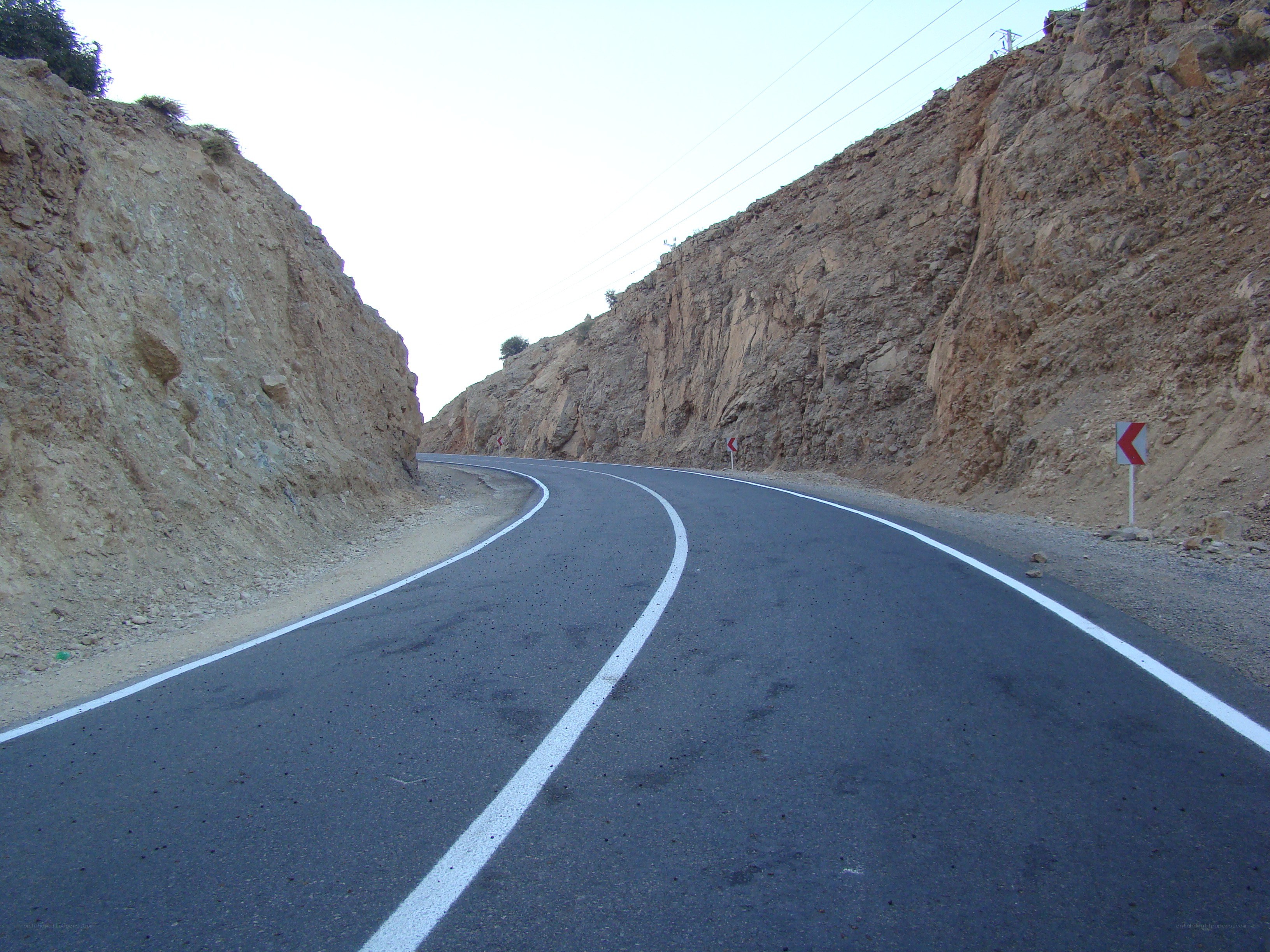 Winding road through rocky canyon