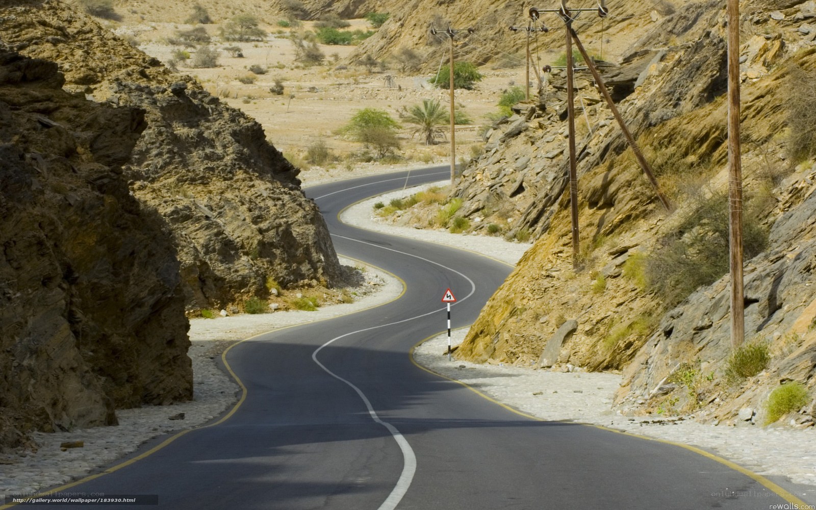 Winding road through rocky canyon