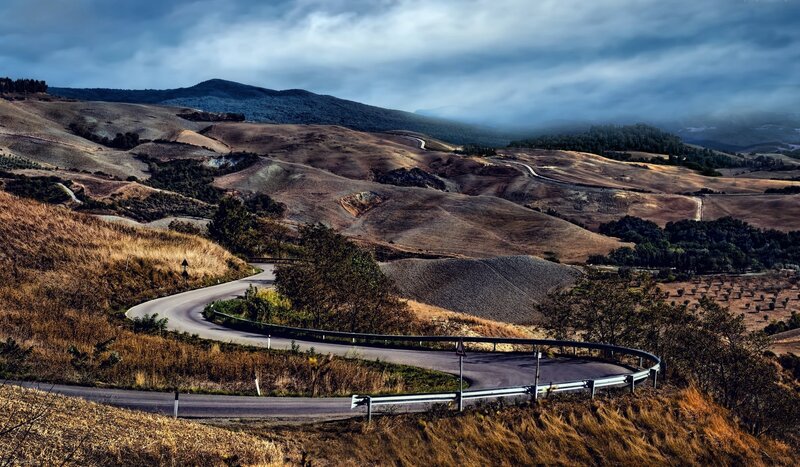 Winding road through rolling hills