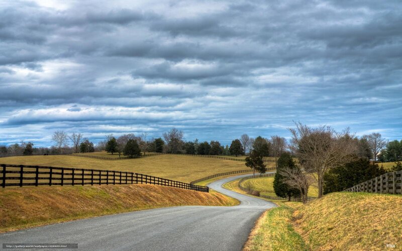 Winding road through rural fields