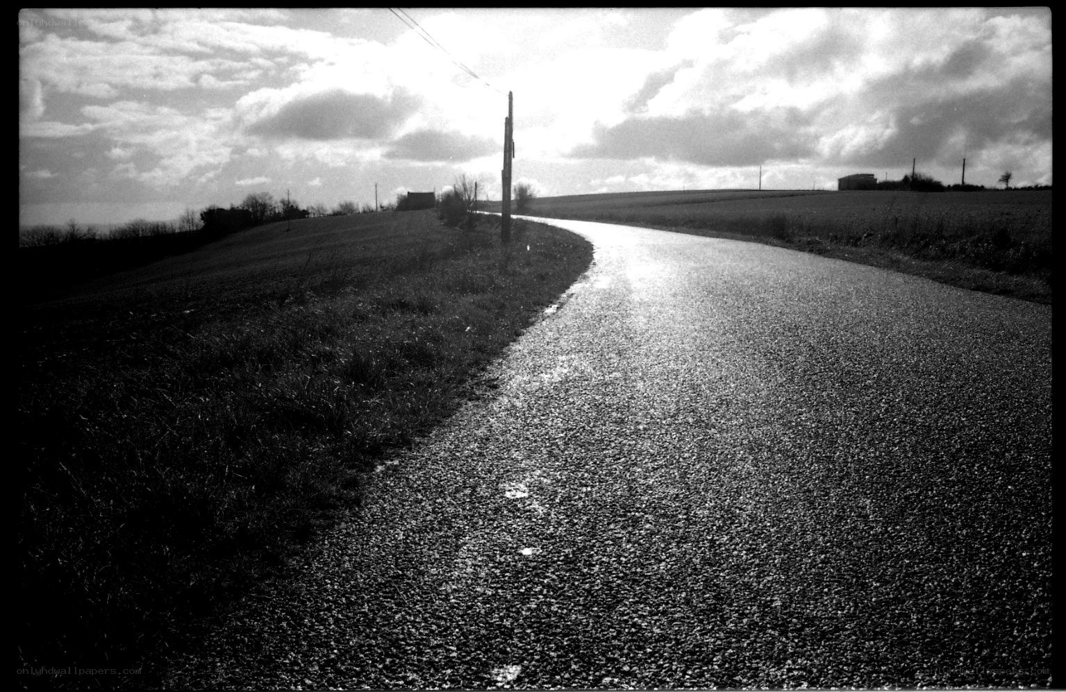 Winding road through rural landscape
