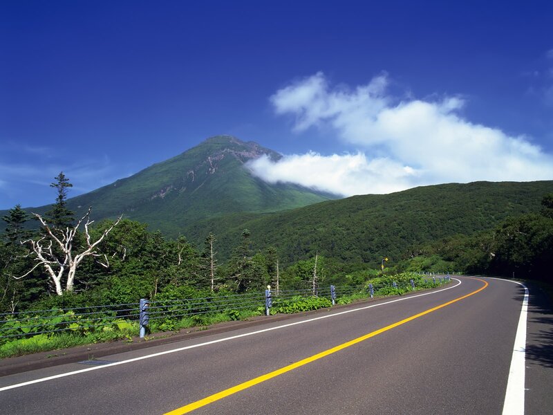 Winding road to a mountain