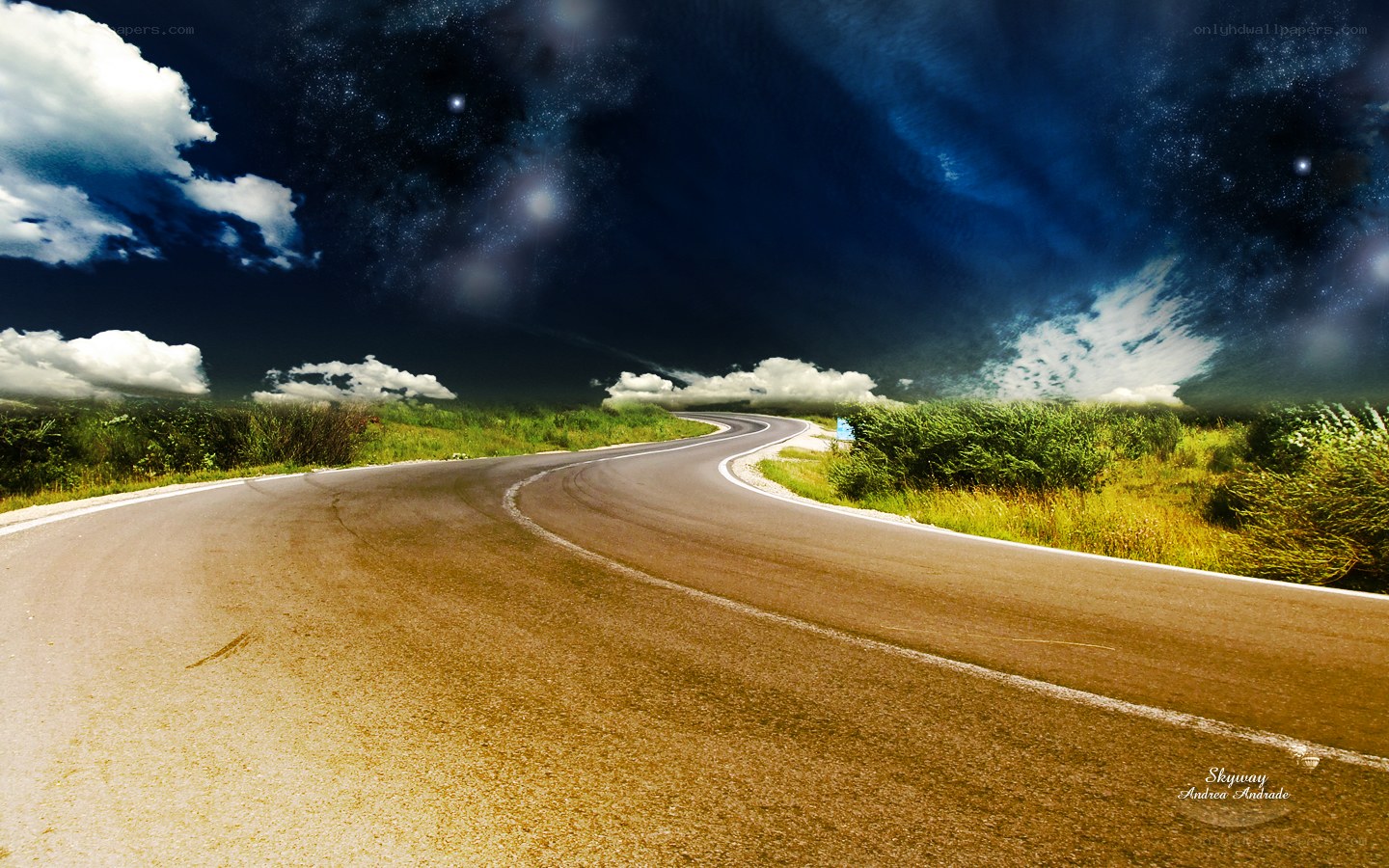 Winding road under starry sky