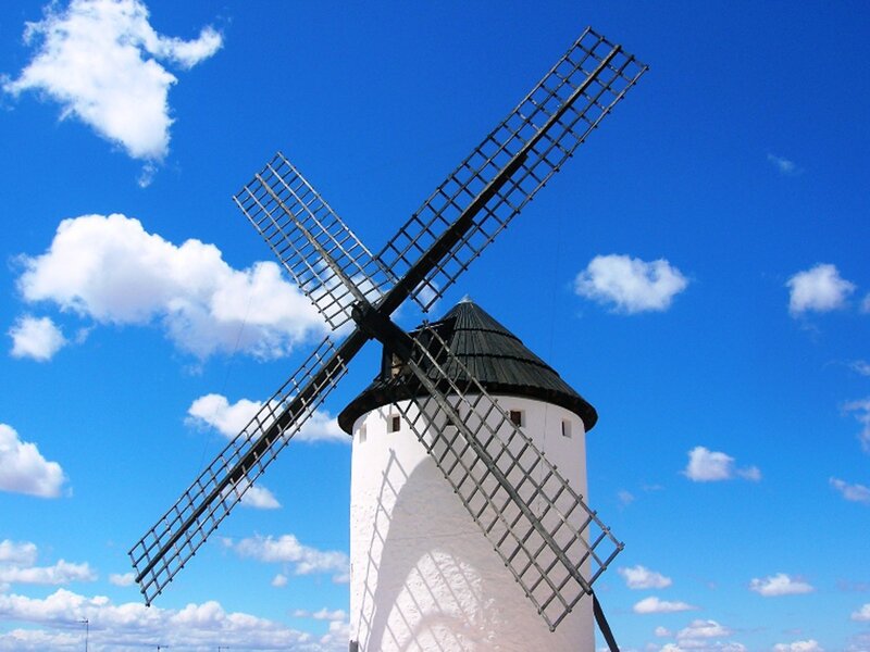 Windmill against blue sky