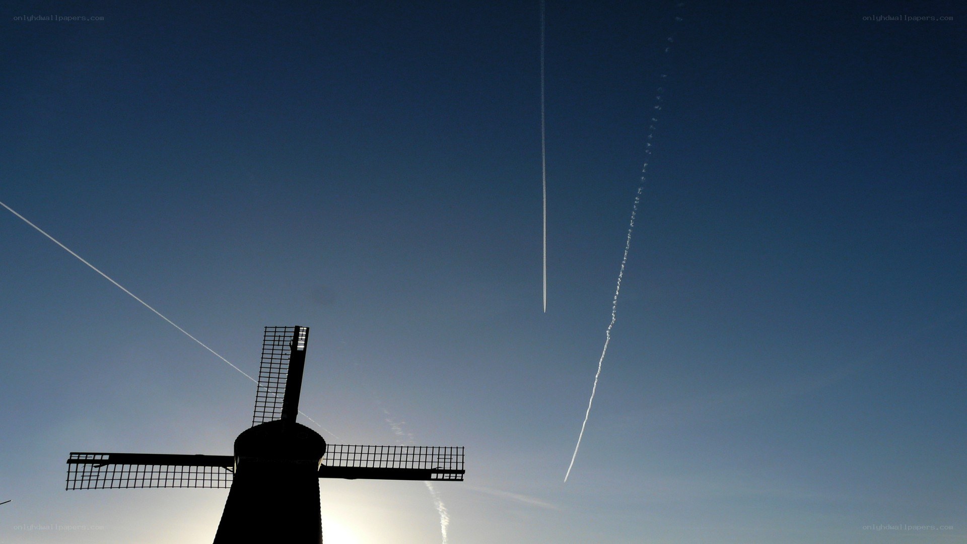 windmill against blue sky