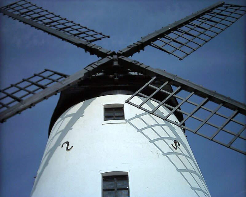 windmill against blue sky