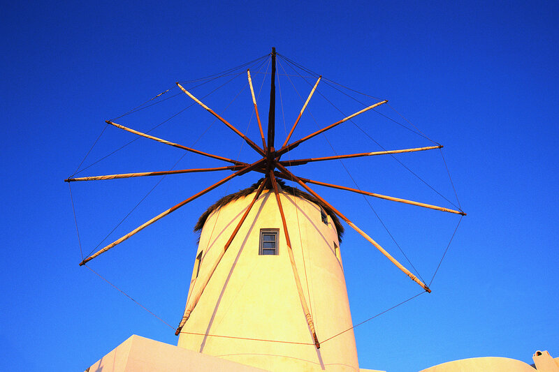 Windmill Against Blue Sky — Dramatic