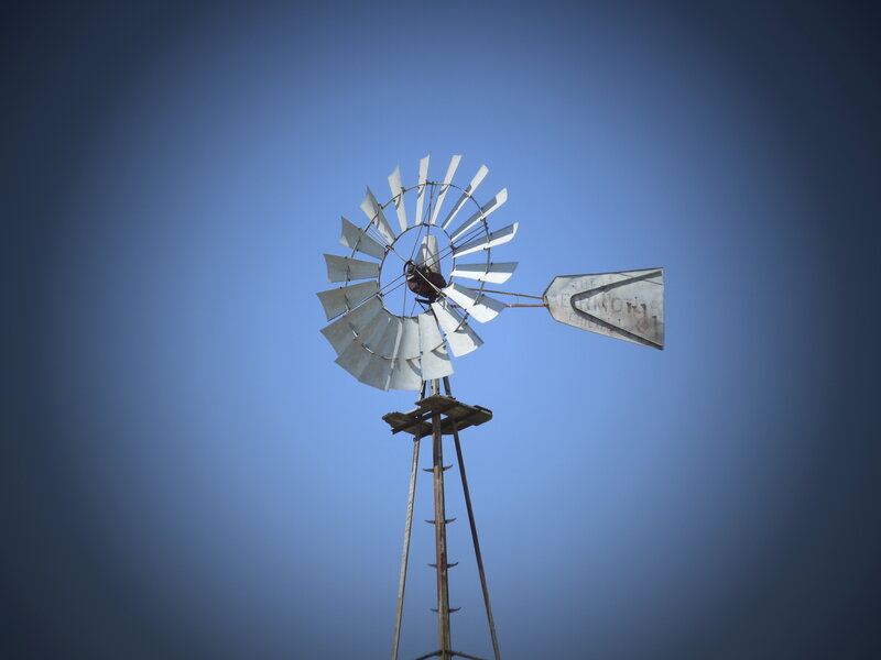 Windmill Against Blue Sky — Serene, Afternoon