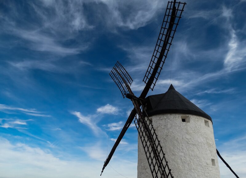 Windmill against blue sky