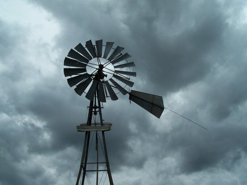 Windmill Against Stormy Sky