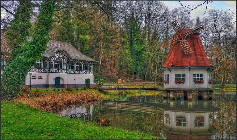 Windmill and House by Pond