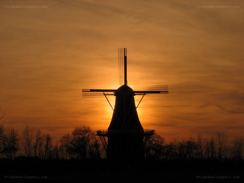 windmill at sunset silhouette