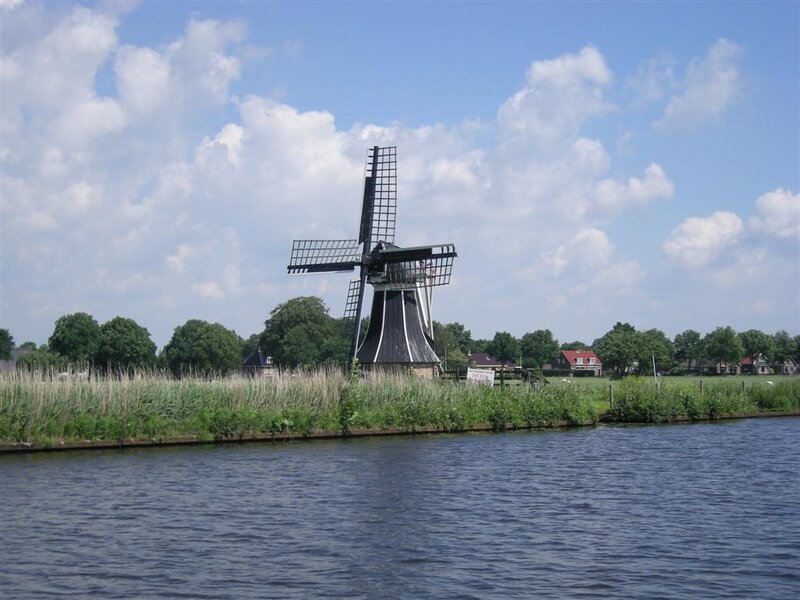 Windmill by a Canal — Blue