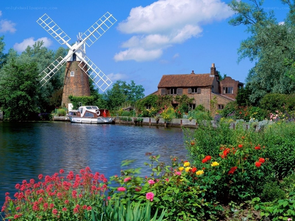 Windmill by a canal in England