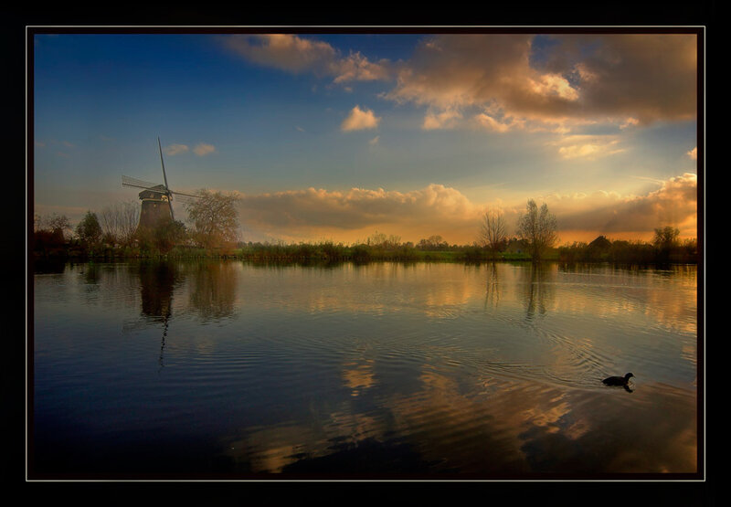 Windmill by a Lake