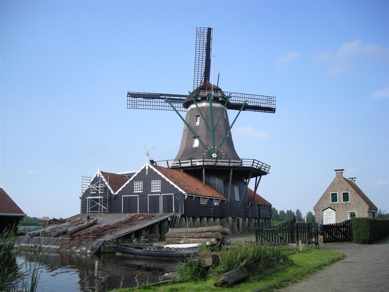 Windmill by Canal — Blue, Serene, Afternoon, Photograph, Buildings