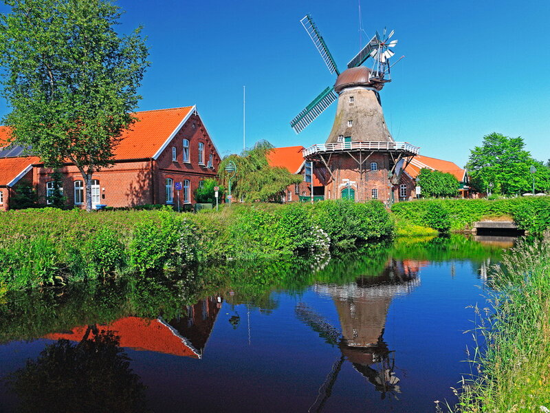 Windmill by Canal — Blue, Serene, Afternoon, Photograph, Buildings, Trees